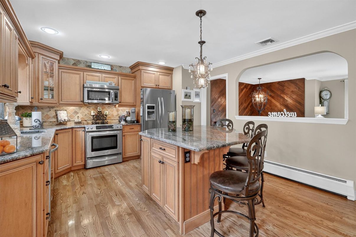 Chandelier, Interior, Kitchen, Pendant Lights, Recessed Lighting, Stainless Steel Appliances, Wood Texture Flooring