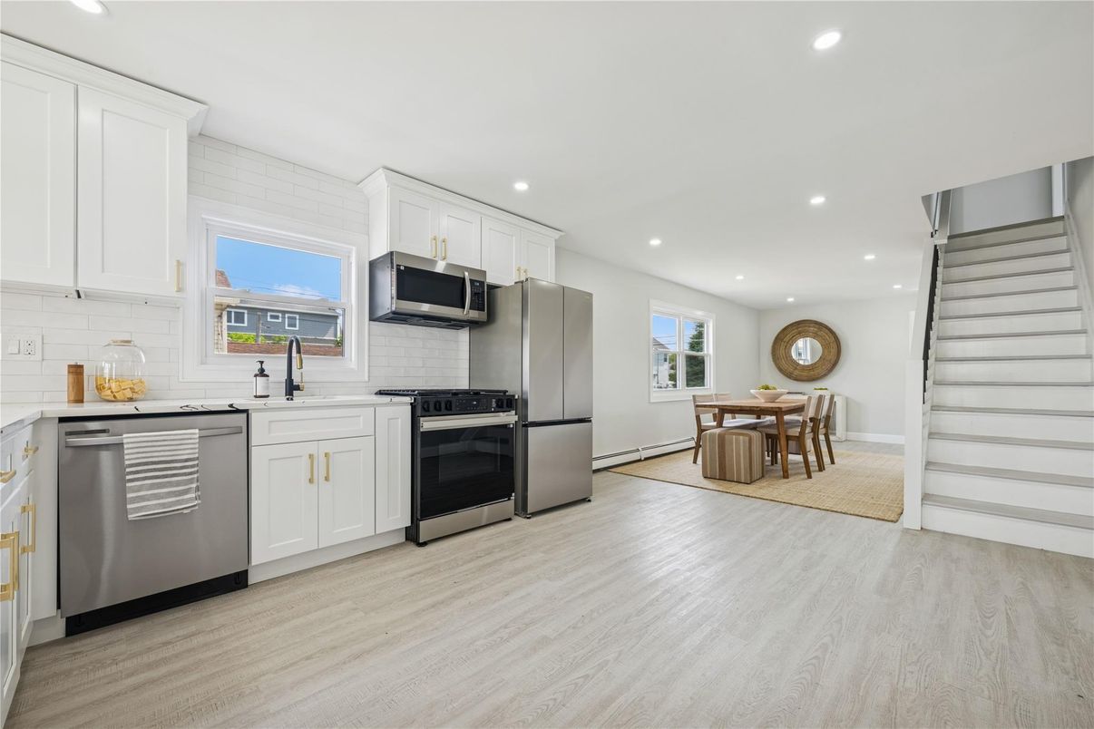 Dining room, Interior, Kitchen, Recessed Lighting, Stainless Steel Appliances, Wood Texture Flooring