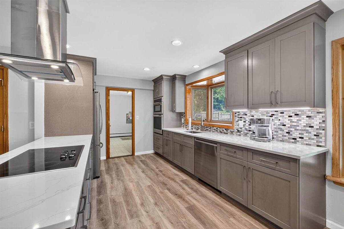 Interior, Kitchen, Recessed Lighting, Stainless Steel Appliances, Wood Texture Flooring