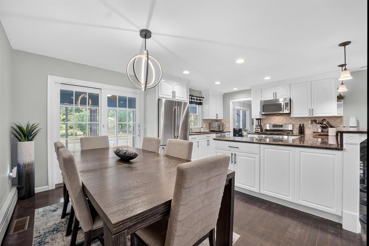 Dining room, Interior, Kitchen, Pendant Lights, Recessed Lighting, Stainless Steel Appliances, Wood Texture Flooring