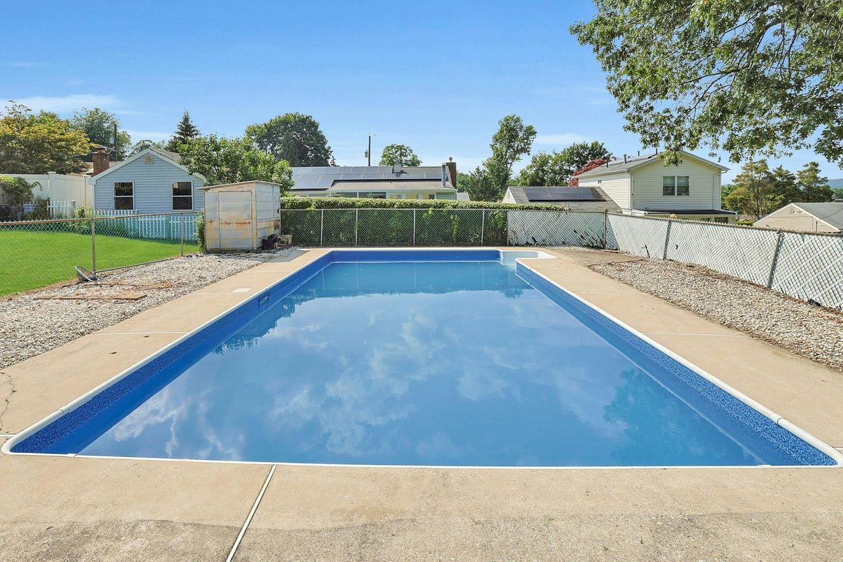 Exterior, Pool, Solar Panels