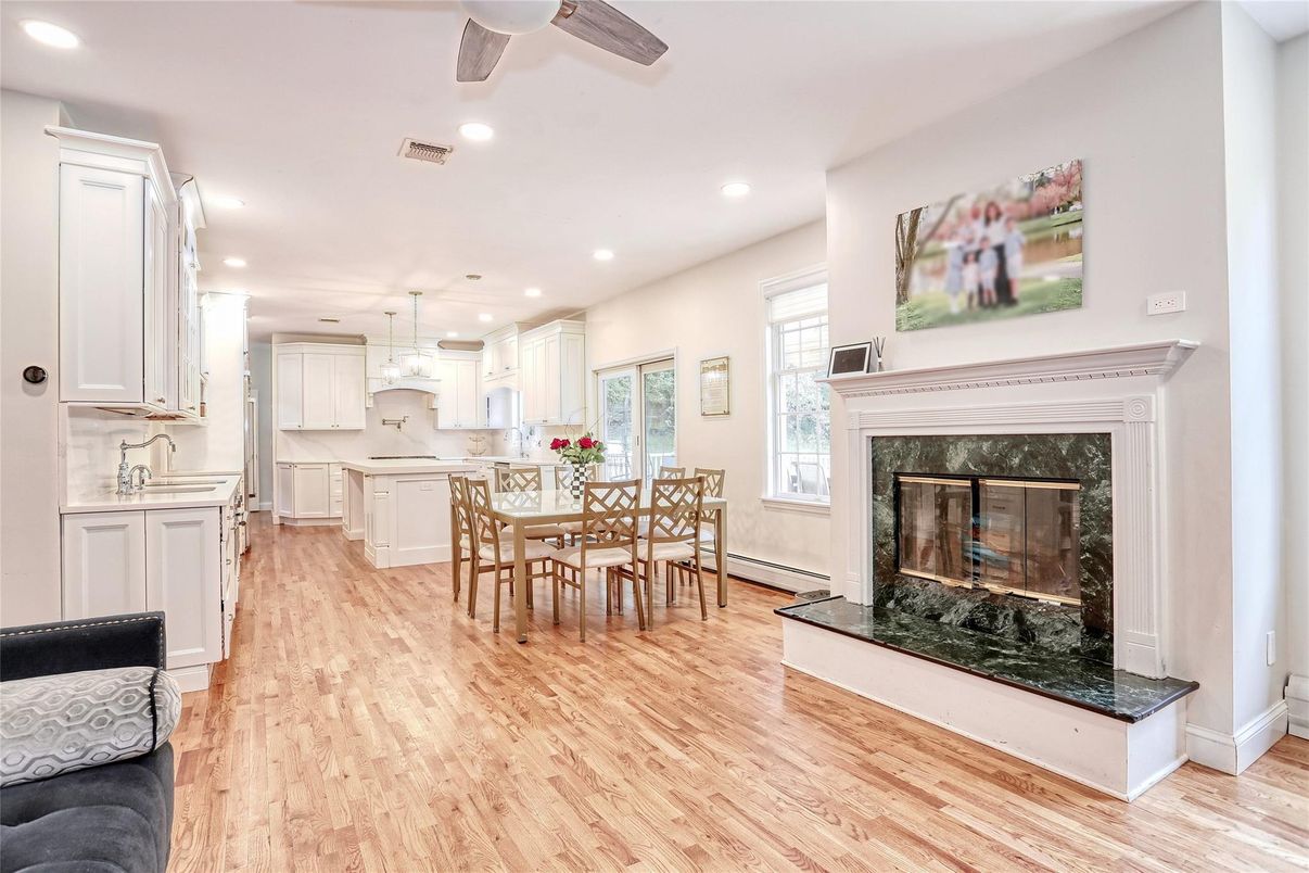 Dining room, Fireplace, Interior, Kitchen, Pendant Lights, Recessed Lighting, Wood Texture Flooring