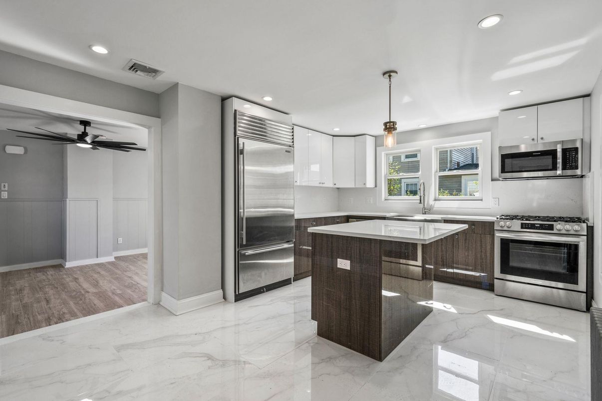 Interior, Kitchen, Marble, Pendant Lights, Recessed Lighting, Stainless Steel Appliances, Wood Texture Flooring