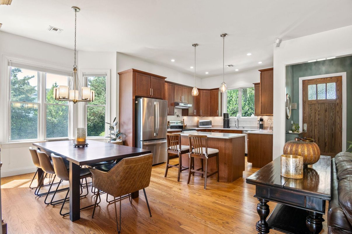 Dining room, Interior, Kitchen, Pendant Lights, Recessed Lighting, Stainless Steel Appliances, Wood Texture Flooring
