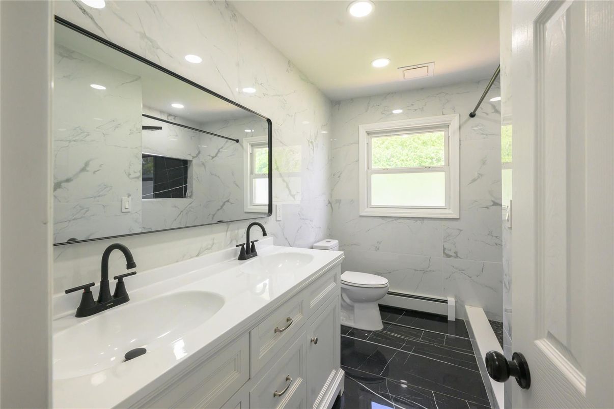 Bathroom, Dual Sink Vanities, Interior, Marble, Marble Walls, Recessed Lighting