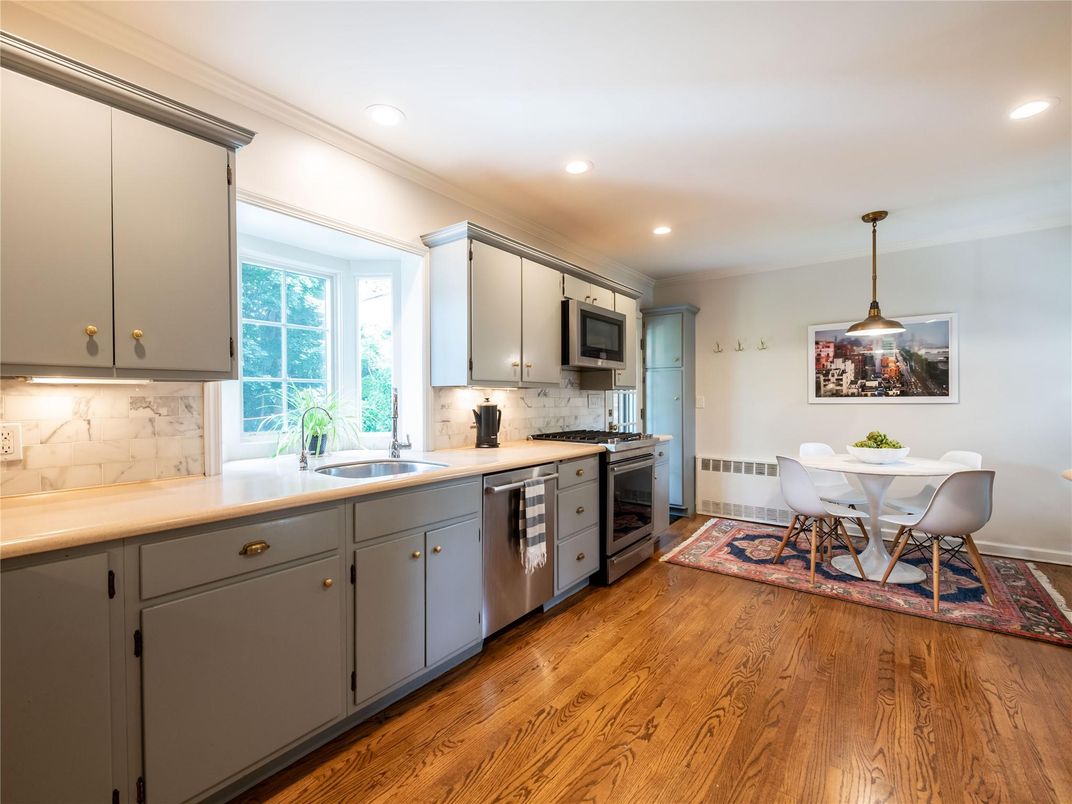 Dining room, Interior, Kitchen, Pendant Lights, Recessed Lighting, Stainless Steel Appliances, Wood Texture Flooring