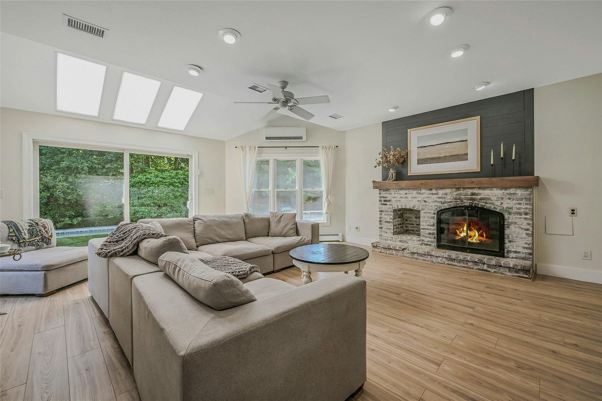 Fireplace, Interior, Living room, Recessed Lighting, Wood Texture Flooring