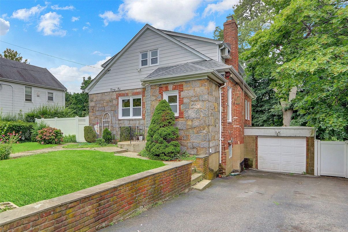 Attached, Exterior, Facade, Brick Facade, Tudor Revival