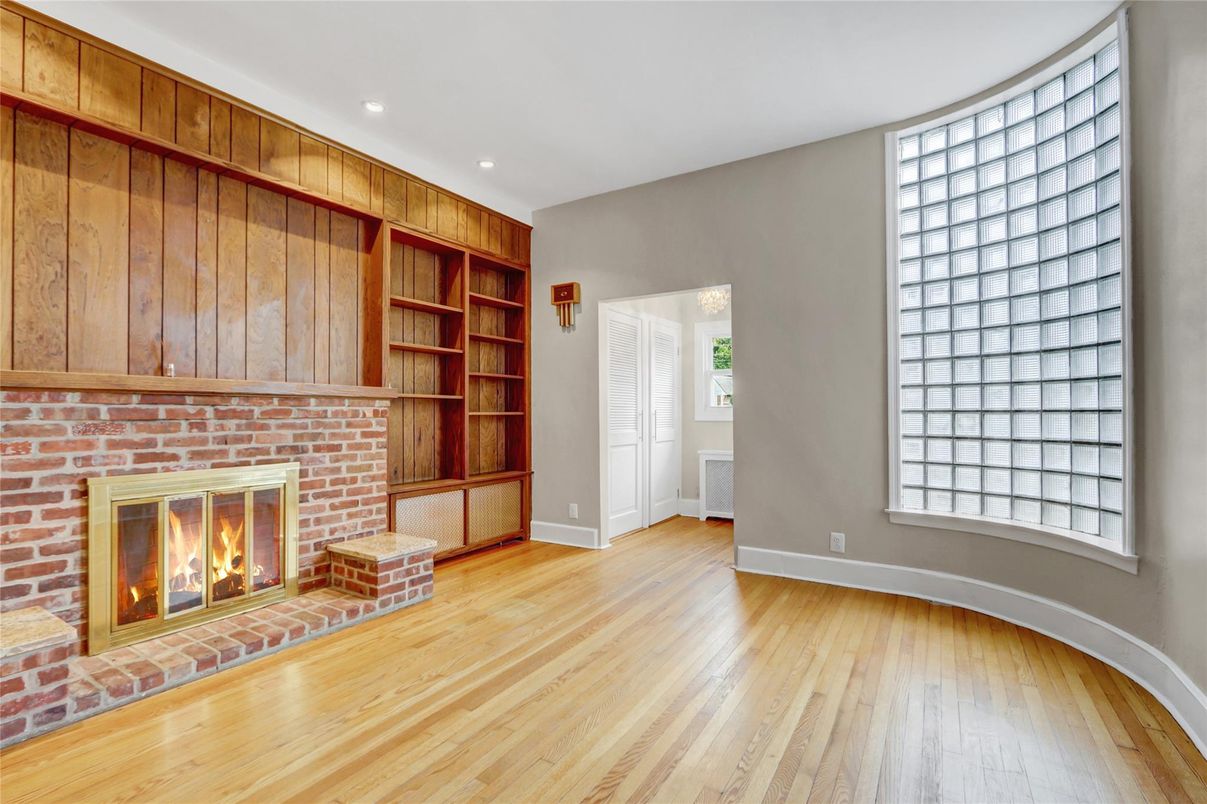 Empty room, Fireplace, Interior, Recessed Lighting, Stone Walls, Wood Texture Flooring