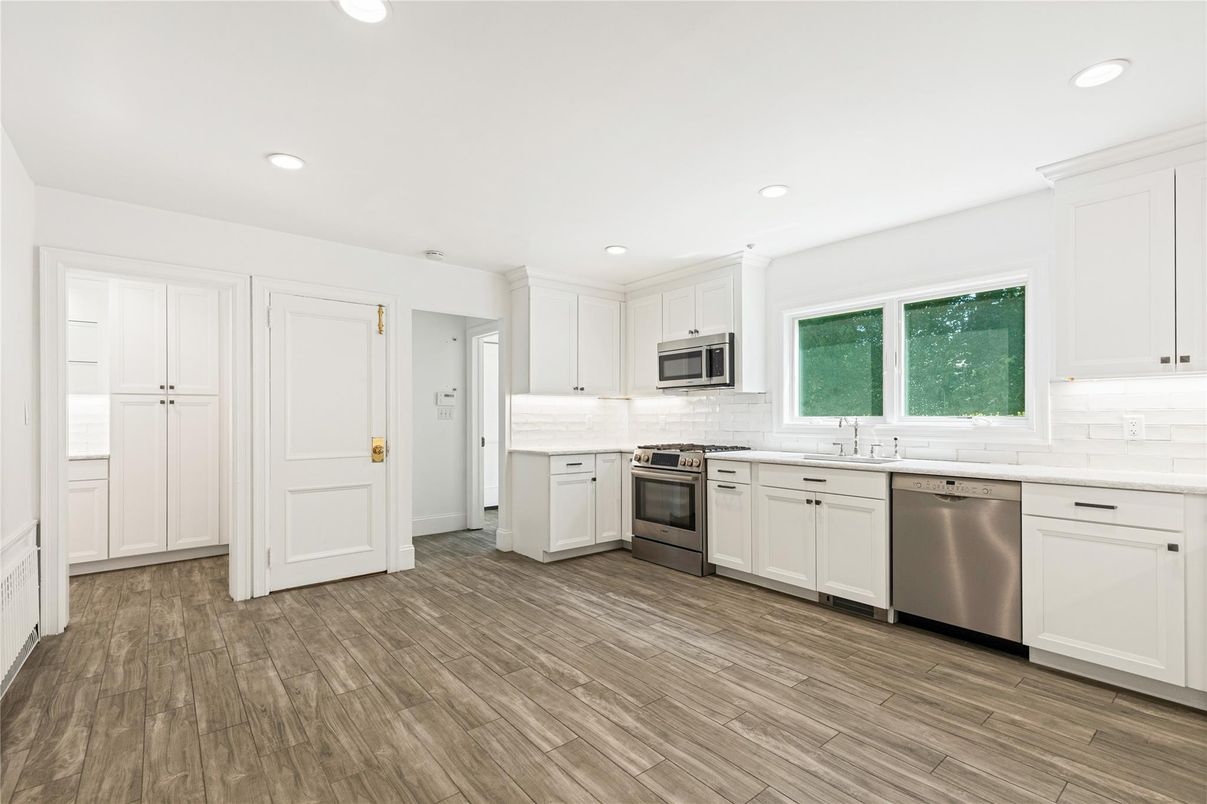 Interior, Kitchen, Recessed Lighting, Stainless Steel Appliances, Wood Texture Flooring