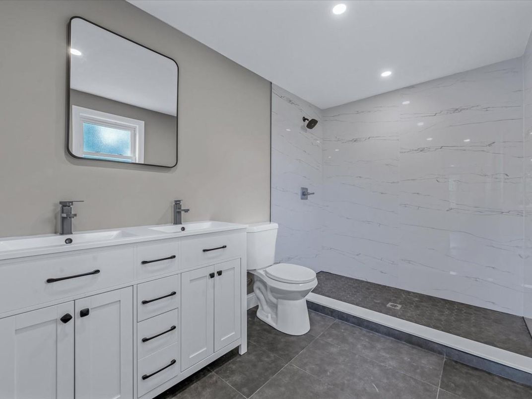 Bathroom, Dual Sink Vanities, Interior, Marble Walls, Recessed Lighting