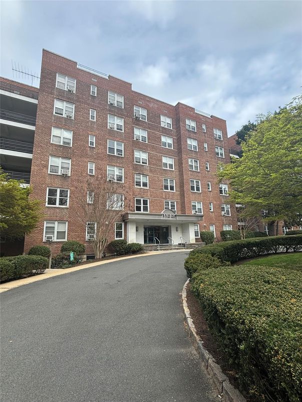 Exterior, Facade, Brick Facade, Condo Building
