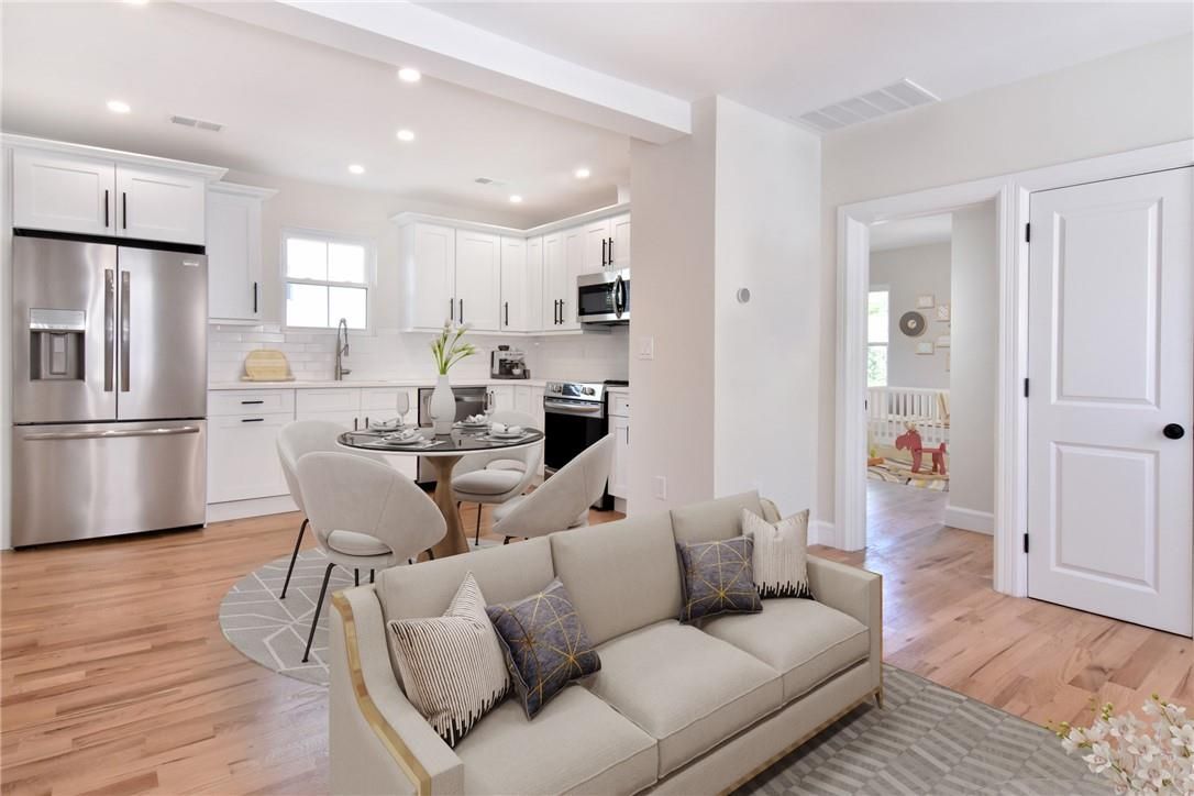 Dining room, Interior, Kitchen, Recessed Lighting, Stainless Steel Appliances, Wood Texture Flooring