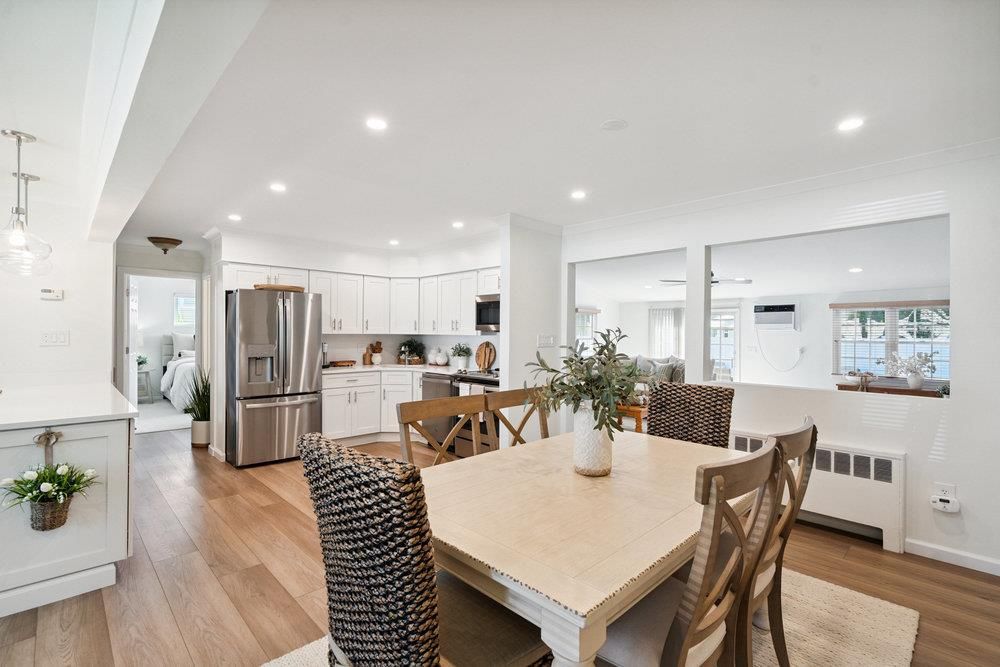 Dining room, Interior, Kitchen, Pendant Lights, Recessed Lighting, Stainless Steel Appliances, Wood Texture Flooring