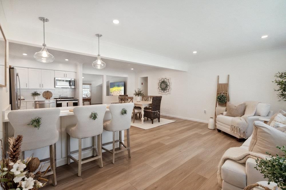 Dining room, Interior, Kitchen, Living room, Pendant Lights, Recessed Lighting, Stainless Steel Appliances, Wood Texture Flooring