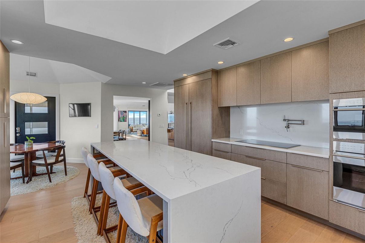 Dining room, Interior, Kitchen, Pendant Lights, Recessed Lighting, Stainless Steel Appliances, Wood Texture Flooring