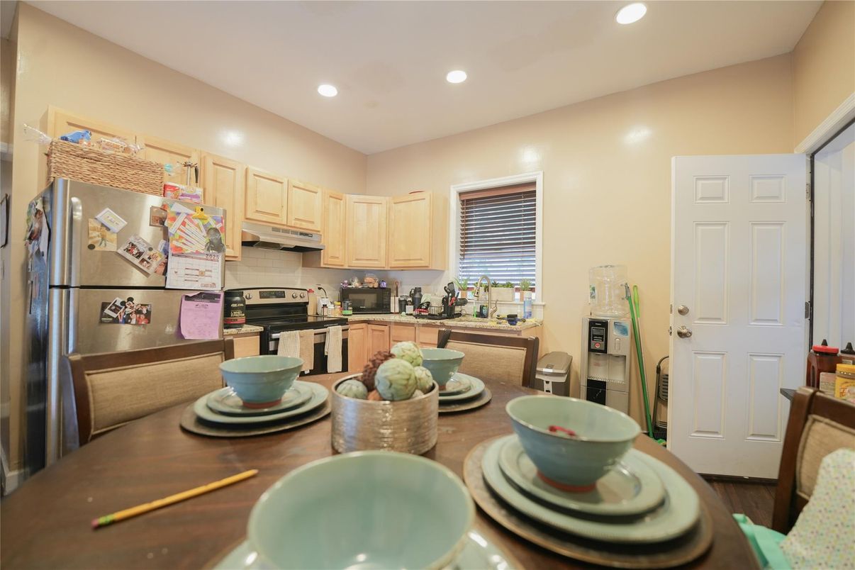 Dining room, Interior, Kitchen, Recessed Lighting, Stainless Steel Appliances, Wood Texture Flooring
