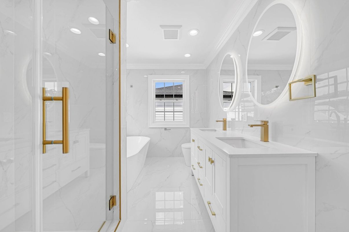 Bathroom, Dual Sink Vanities, Glass Shower, Interior, Marble, Marble Walls, Recessed Lighting