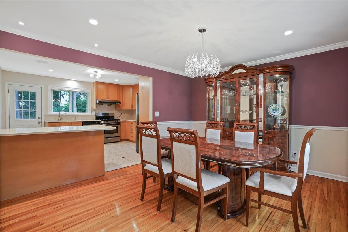 Chandelier, Dining room, Interior, Kitchen, Recessed Lighting, Stainless Steel Appliances, Wood Texture Flooring