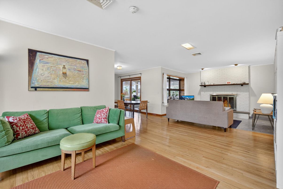 Dining room, Fireplace, Interior, Living room, Recessed Lighting, Wood Texture Flooring