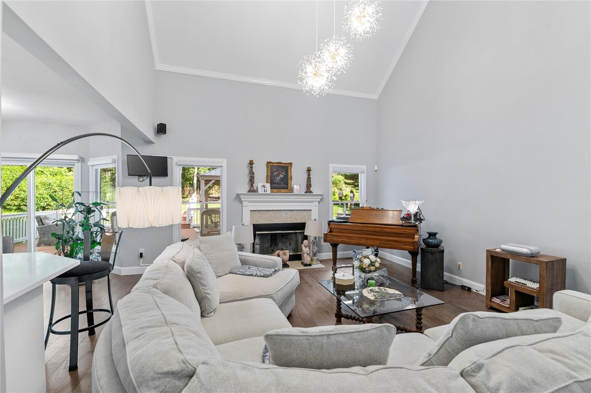 Chandelier, Fireplace, Interior, Living room, Piano, Wood Texture Flooring