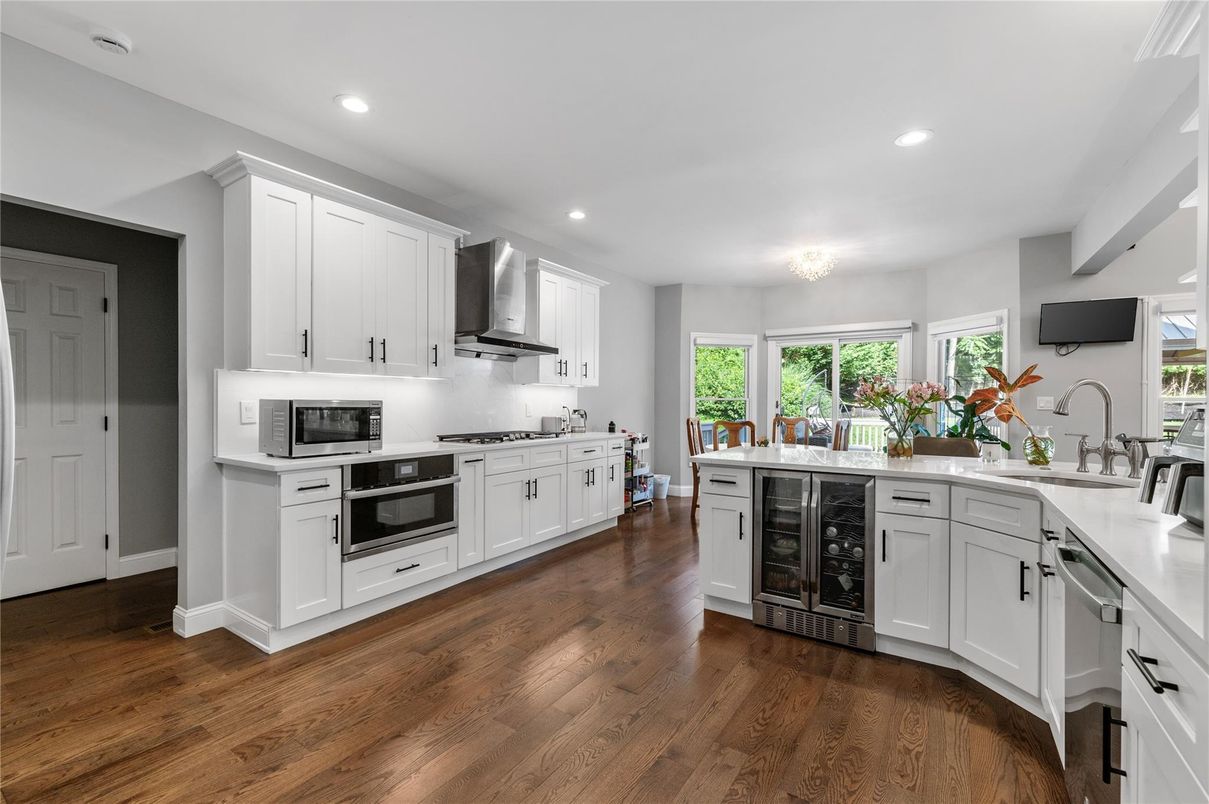 Chandelier, Interior, Kitchen, Recessed Lighting, Stainless Steel Appliances, Wood Texture Flooring