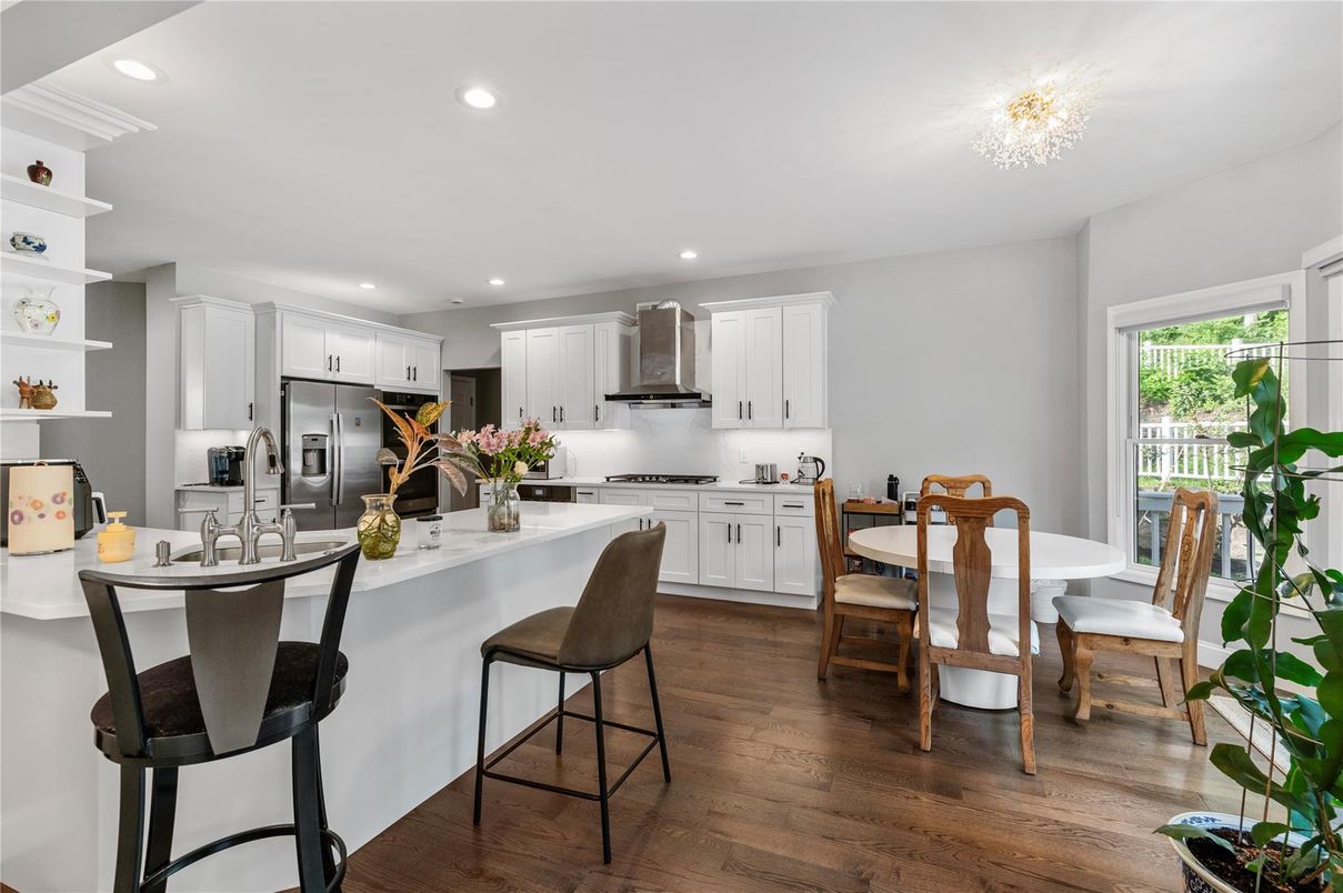 Dining room, Interior, Kitchen, Recessed Lighting, Stainless Steel Appliances, Wood Texture Flooring