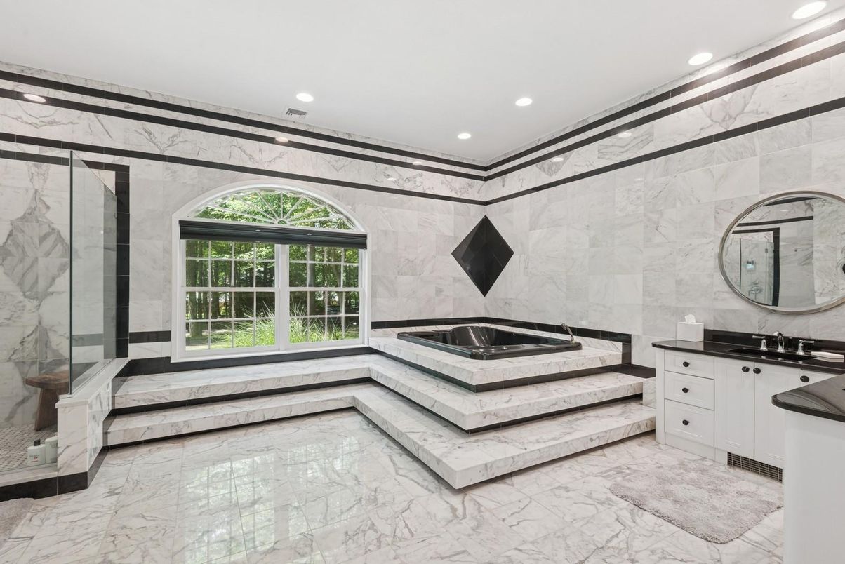 Bathroom, Dual Sink Vanities, Glass Shower, Interior, Marble, Marble Walls, Recessed Lighting