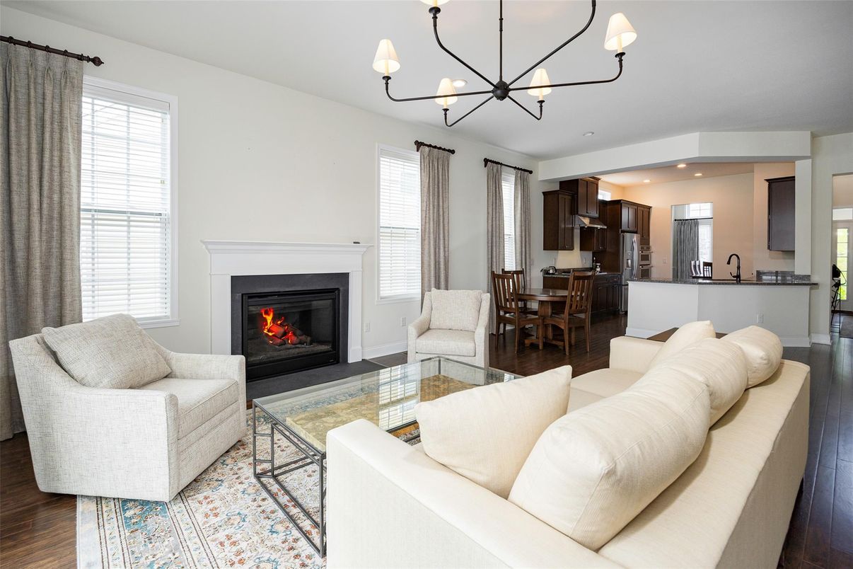 Chandelier, Dining room, Fireplace, Interior, Kitchen, Living room, Recessed Lighting, Wood Texture Flooring