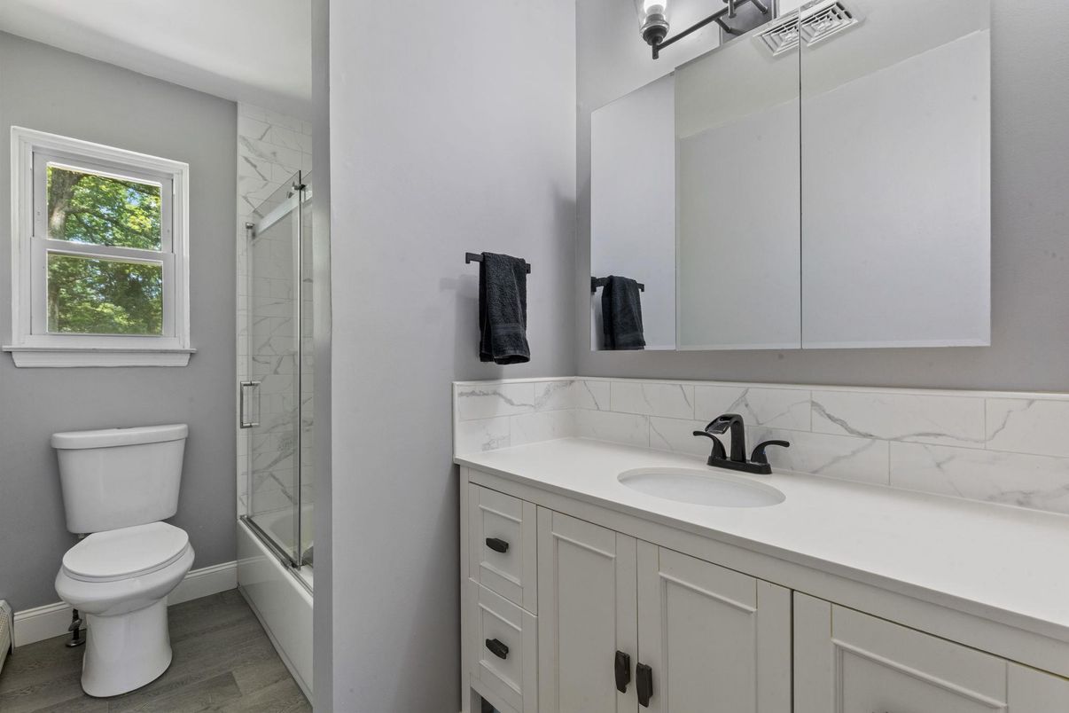 Bathroom, Glass Shower, Interior, Marble Walls, Wood Texture Flooring