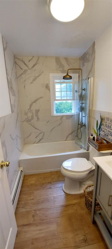 Bathroom, Glass Shower, Interior, Marble Walls, Wood Texture Flooring