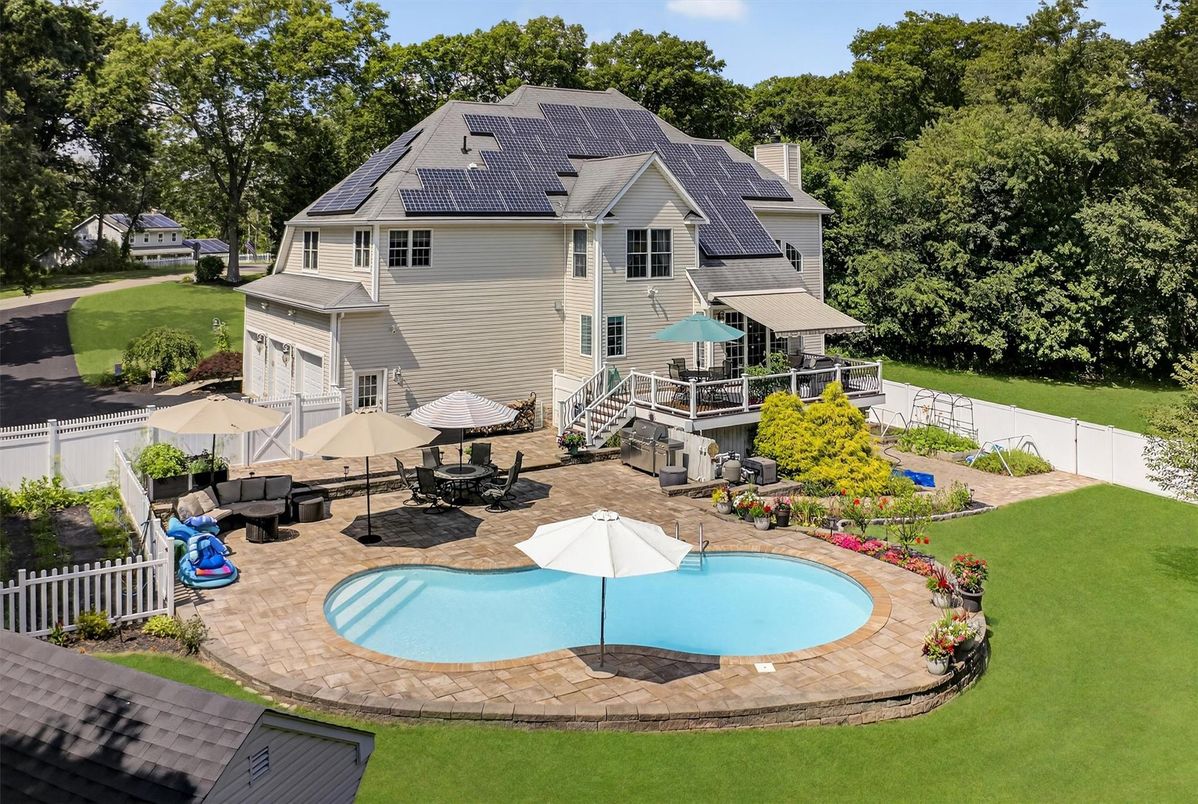 Exterior, Pool, Solar Panels