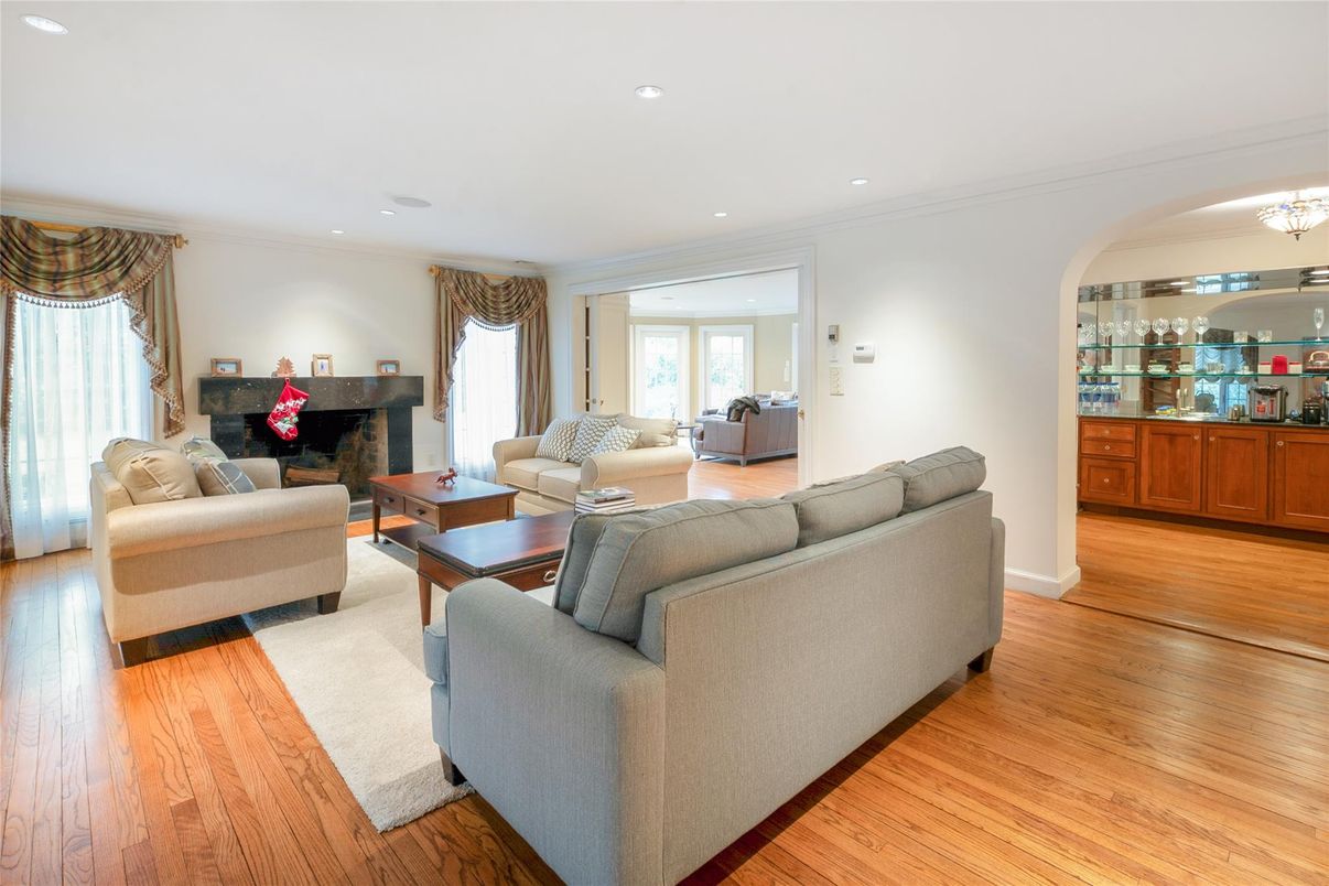 Chandelier, Fireplace, Interior, Living room, Recessed Lighting, Wood Texture Flooring