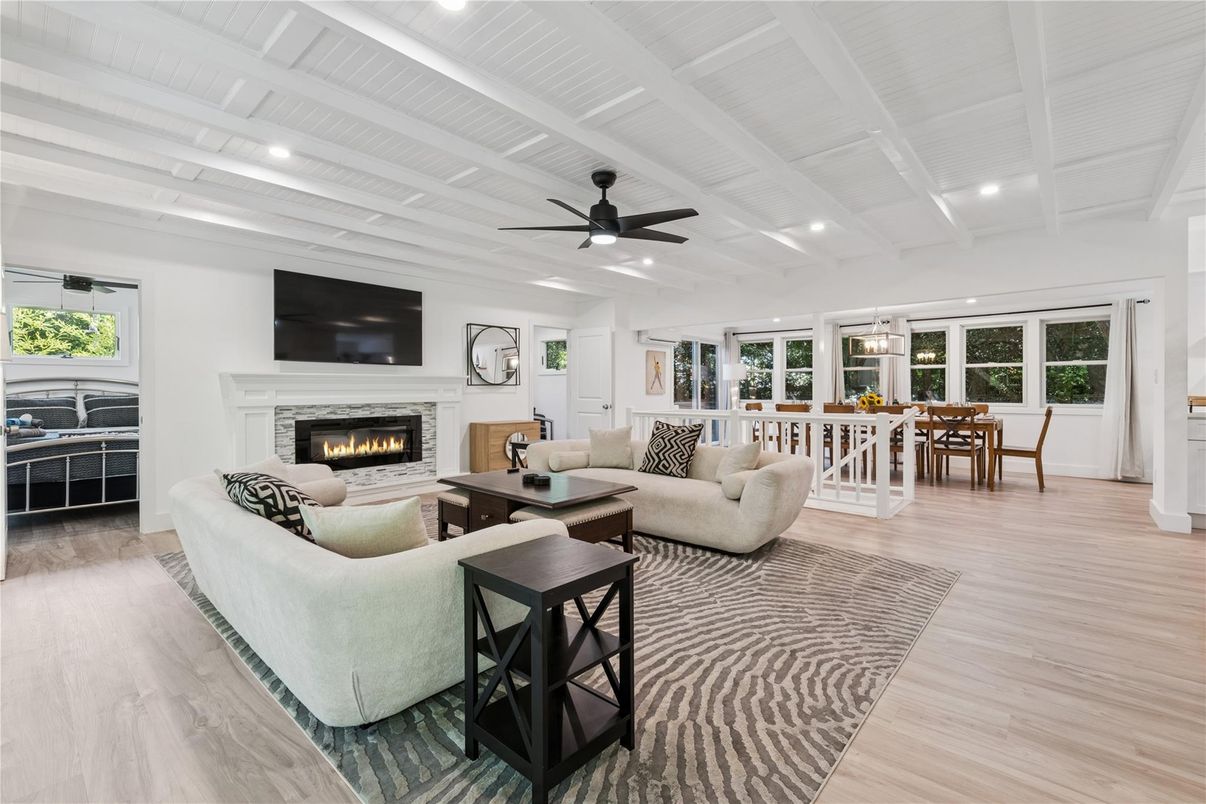 Dining room, Fireplace, Interior, Living room, Pendant Lights, Recessed Lighting, Wood Texture Flooring