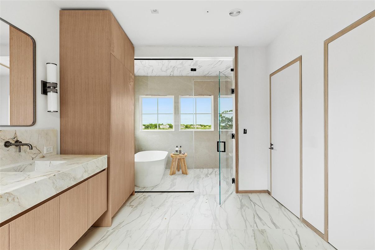 Bathroom, Free Standing Baths, Glass Shower, Interior, Marble, Marble Walls, Recessed Lighting