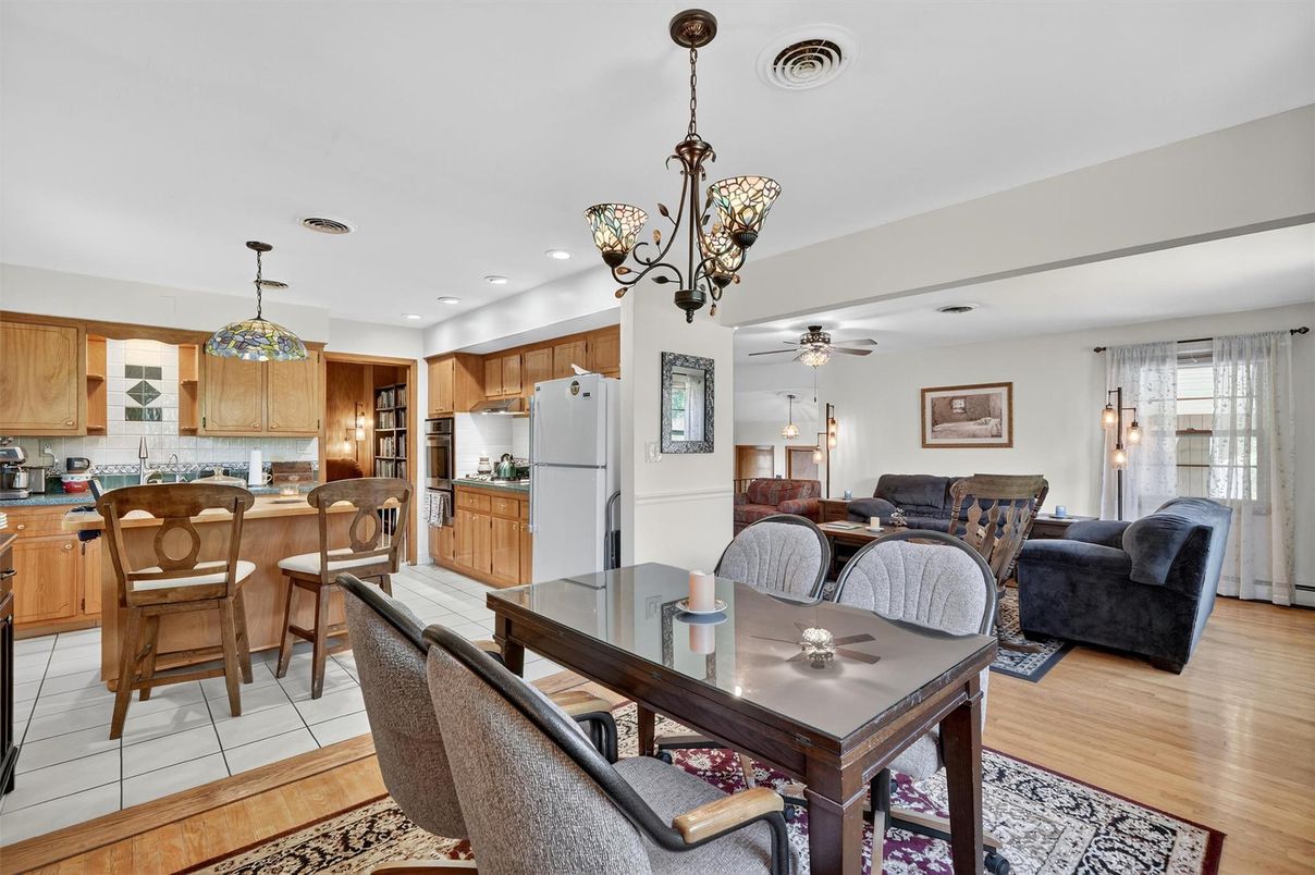 Chandelier, Dining room, Interior, Kitchen, Living room, Pendant Lights, Recessed Lighting, Wood Texture Flooring