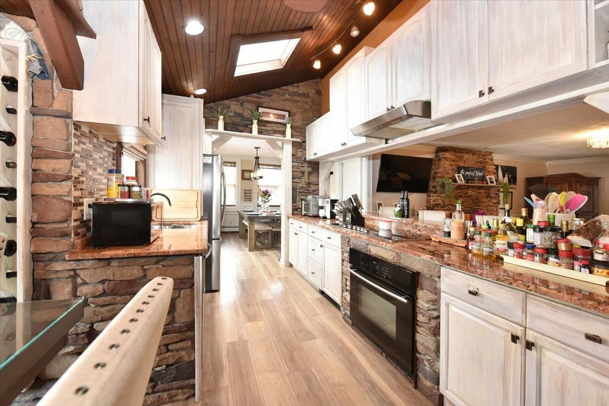 Interior, Kitchen, Recessed Lighting, Stainless Steel Appliances, Stone Walls, Wooden Ceilings, Wood Texture Flooring