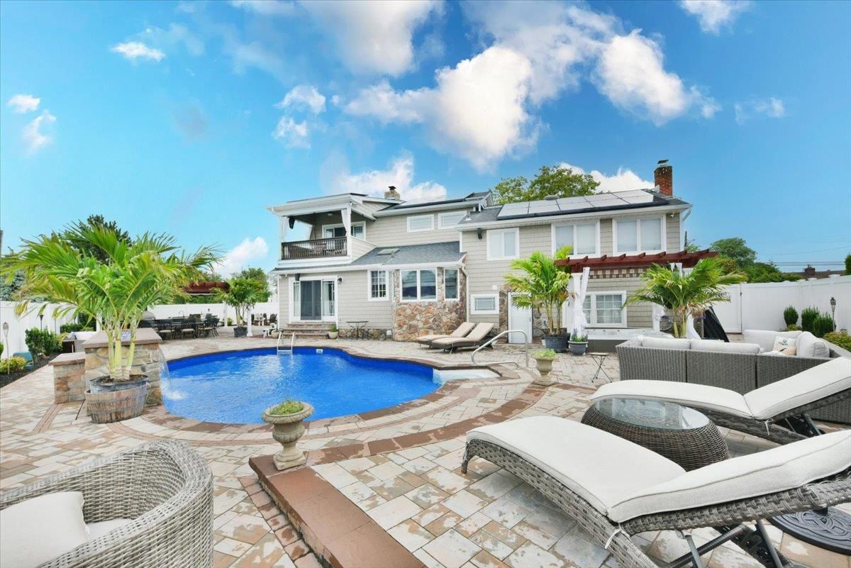 Exterior, Pool, Solar Panels