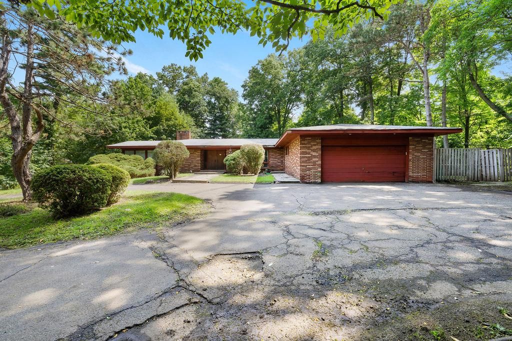 Attached, Backyard, Exterior, Facade, Brick Facade, None