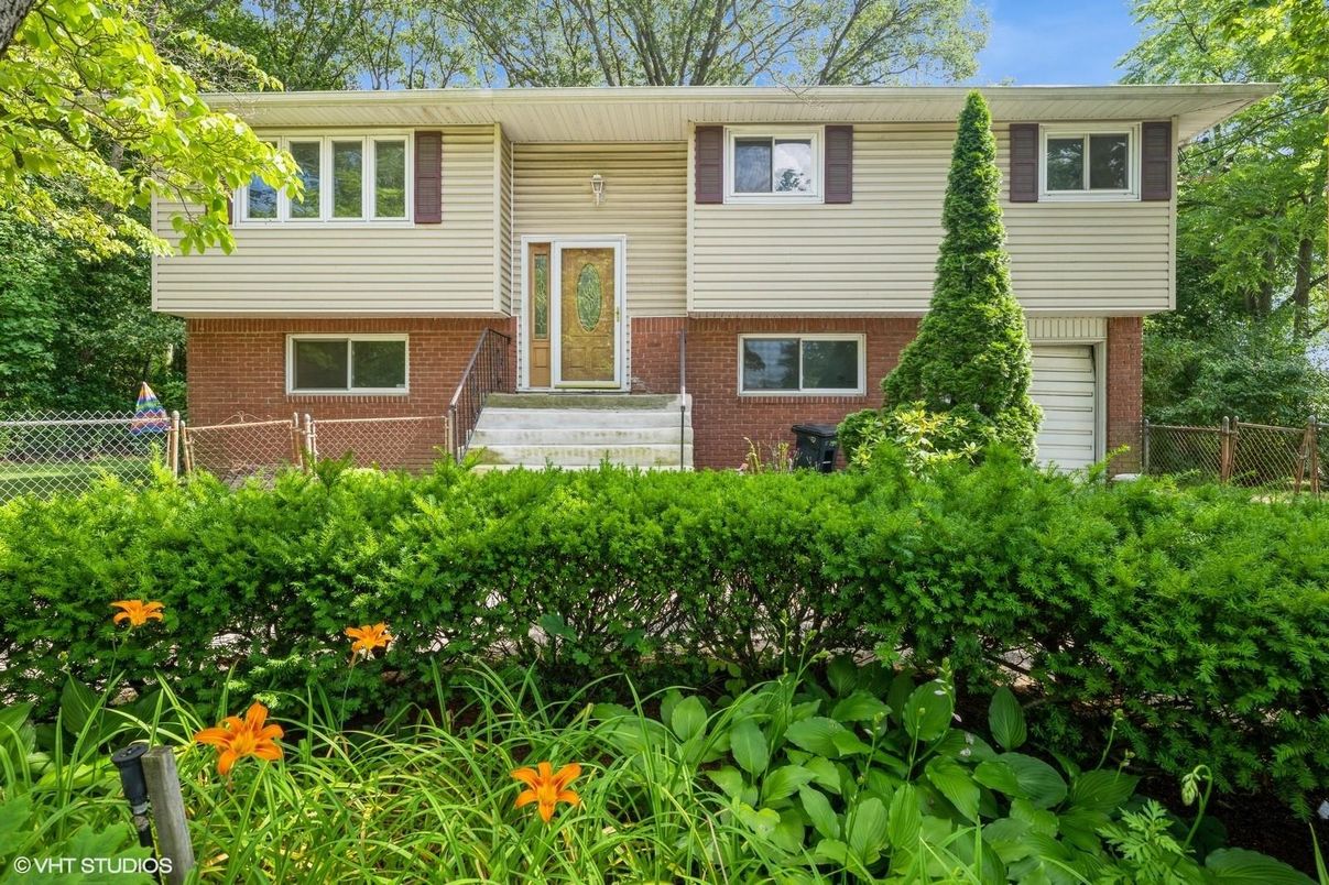 Exterior, Facade, Brick Facade, Raised Ranch