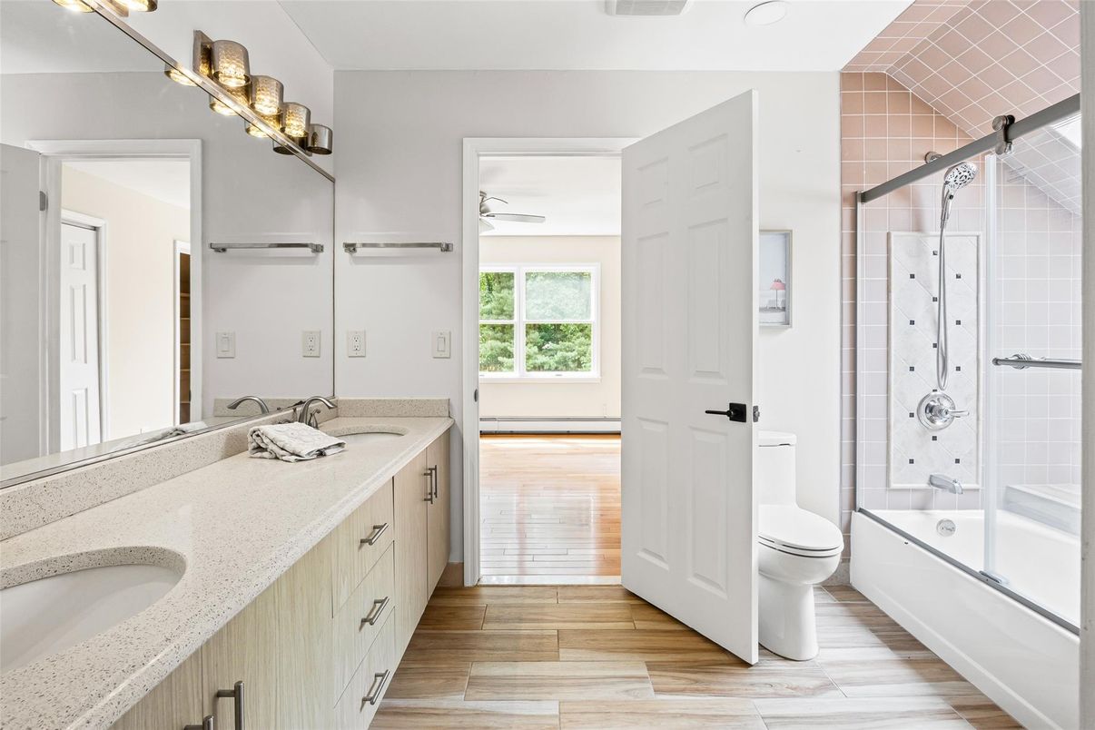 Bathroom, Dual Sink Vanities, Glass Shower, Interior, Wood Texture Flooring
