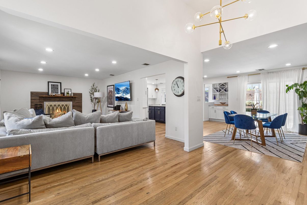 Dining room, Fireplace, Interior, Living room, Pendant Lights, Recessed Lighting, Wood Texture Flooring