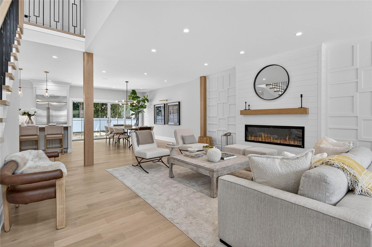 Dining room, Fireplace, Interior, Living room, Pendant Lights, Recessed Lighting, Wood Texture Flooring