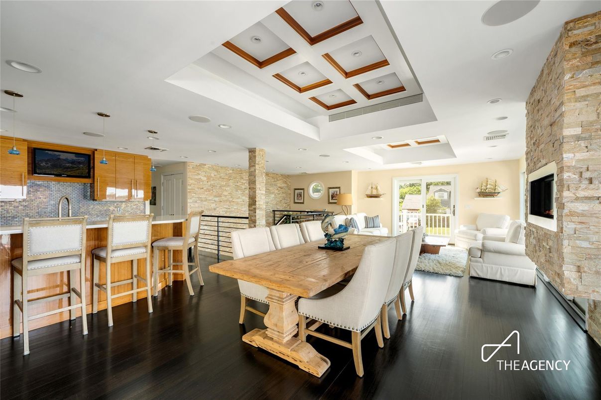 Dining room, Interior, Living room, Pendant Lights, Recessed Lighting, Stone Walls, Wood Texture Flooring