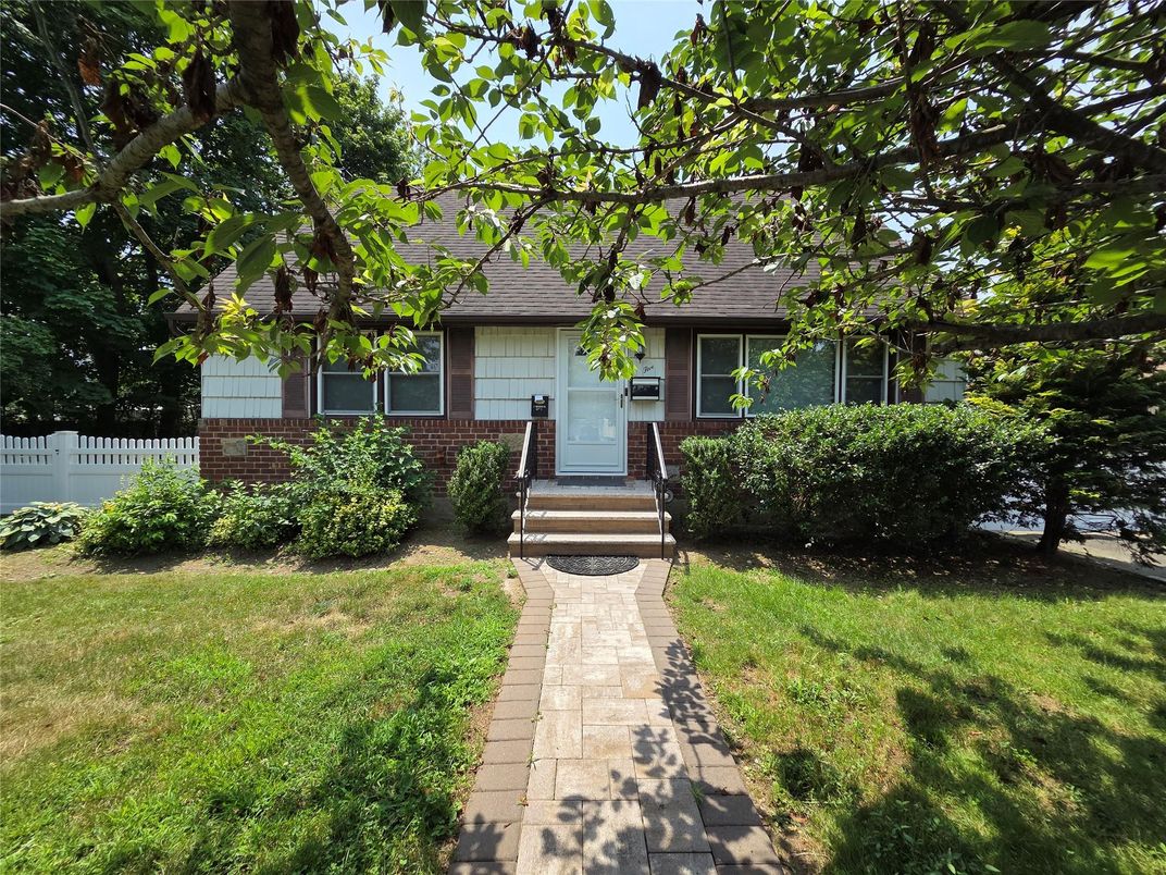 Exterior, Facade, Brick Facade, Cape Cod