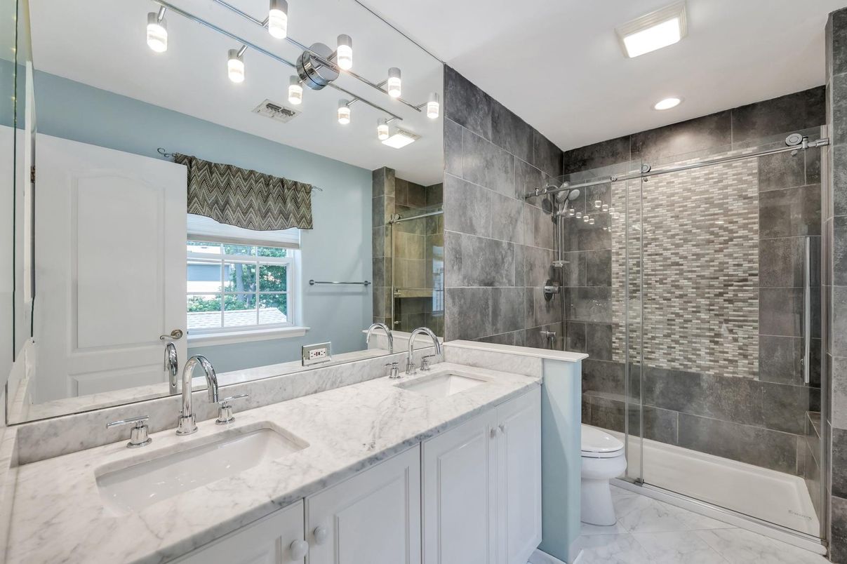 Bathroom, Dual Sink Vanities, Glass Shower, Interior, Marble, Recessed Lighting