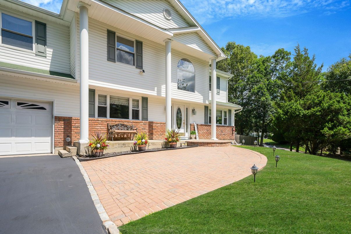 Attached, Exterior, Facade, Brick Facade, Rowhouse