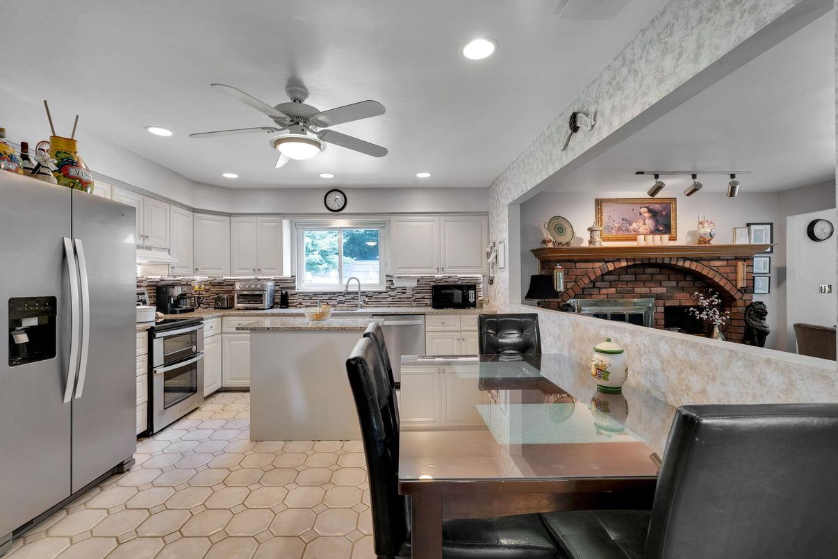 Fireplace, Interior, Kitchen, Recessed Lighting, Stainless Steel Appliances