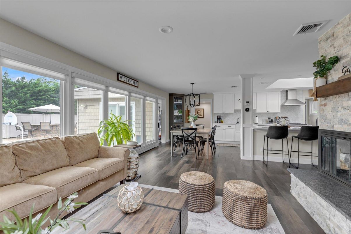 Dining room, Fireplace, Interior, Kitchen, Living room, Pendant Lights, Recessed Lighting, Stone Walls, Wood Texture Flooring