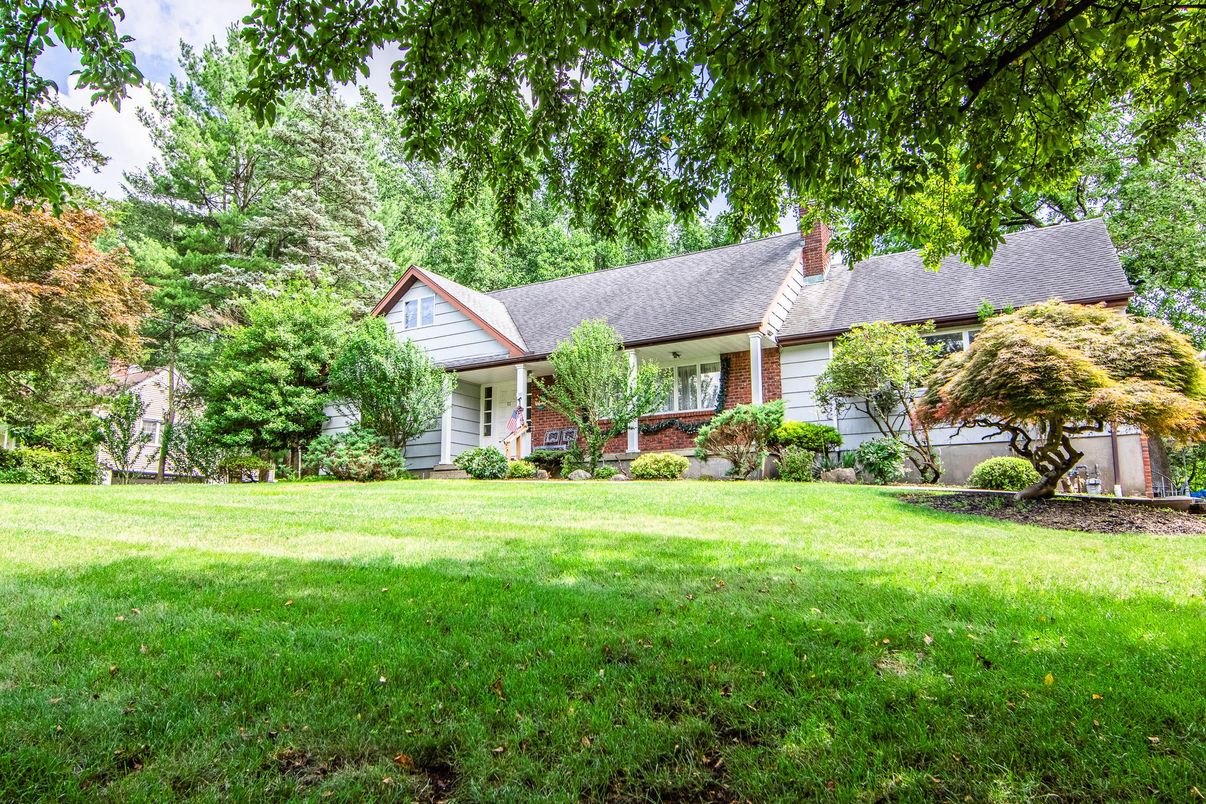 Attached, Backyard, Exterior, Facade, Brick Facade, Cape Cod